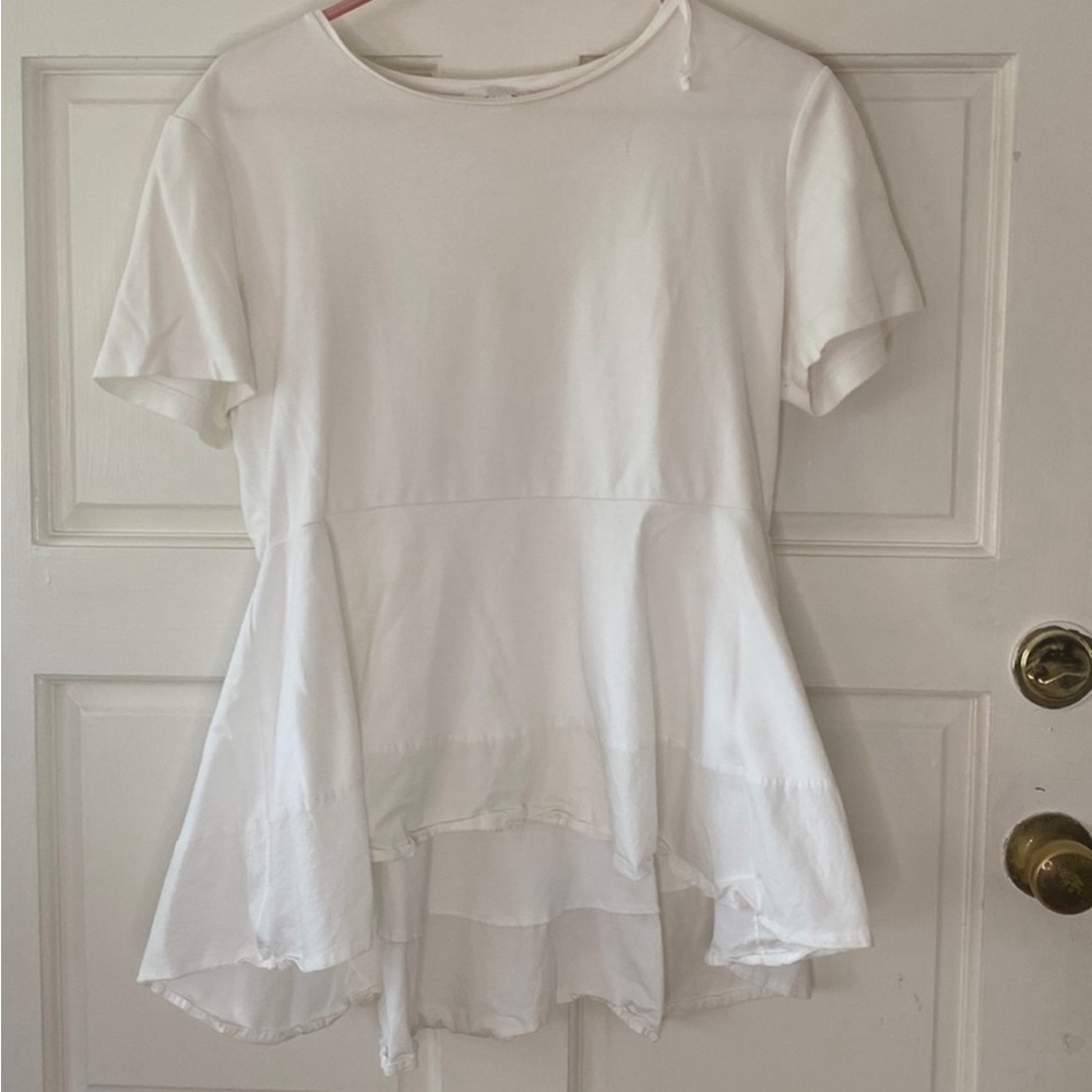 COS size large white peplum tee shirt; small stain on sleeve; wrinkles iron out